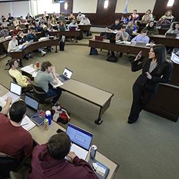 A professor teaching in a classroom