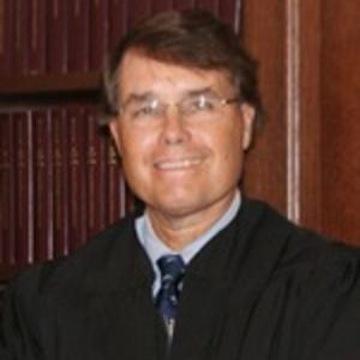 The Honorable William E. Smith