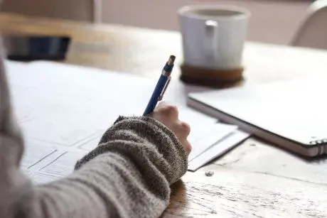 Writing in a notebook