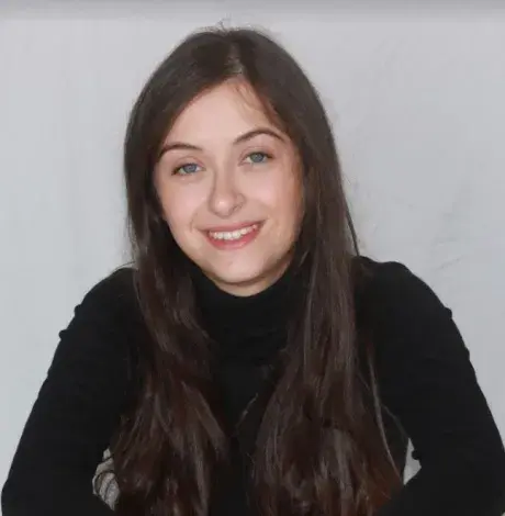 Female law student smiling at the camera 