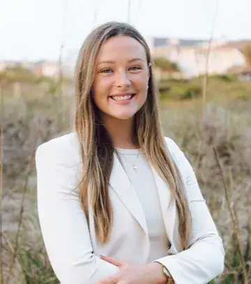 Female law student smiling at the camera 