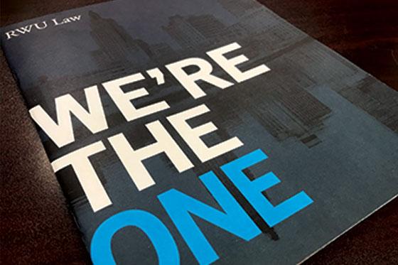 A page of the RWU Guestbook with a quote reading "We're the one" in blue and white text