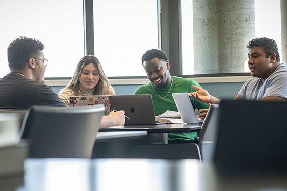 Students collaborating around a table