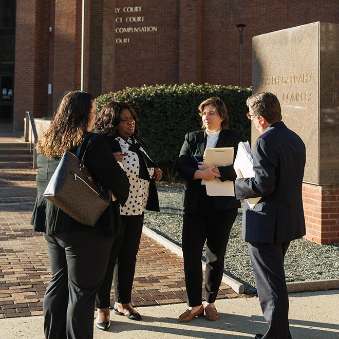 Law students gather in Providence outside the RI courts
