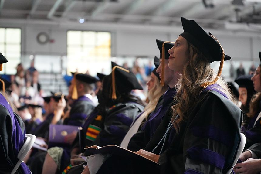 Graduates watch ceremony