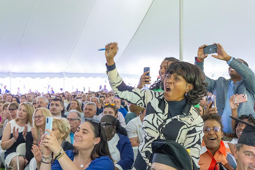 An audience member cheers