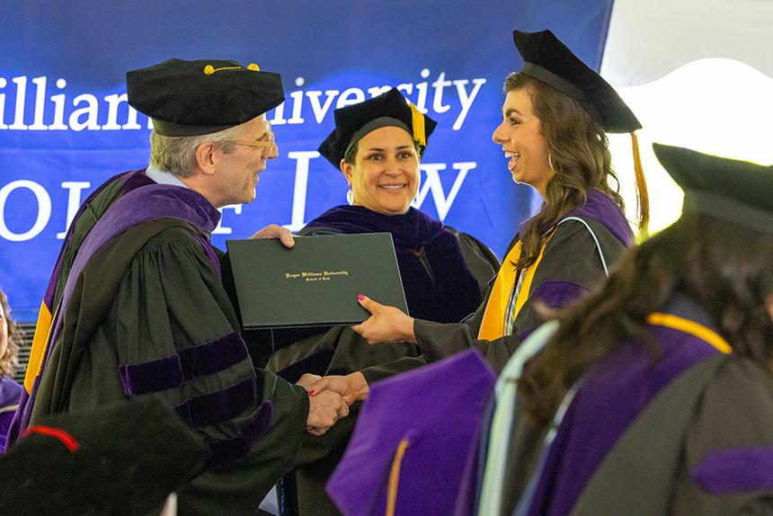 A graduate receives their degree