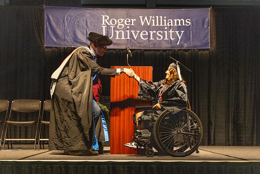 A graduate receives their degree